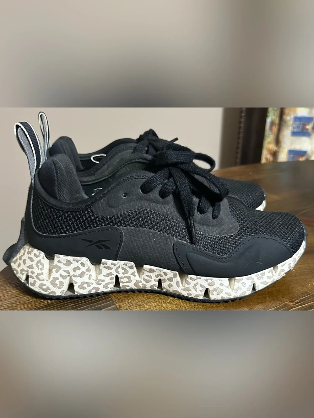 Reebok Black Athletic Sneakers with Leopard-Print Sole